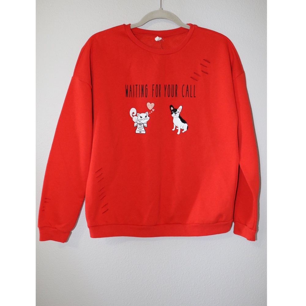 Women’s red graphic crewneck sweater
